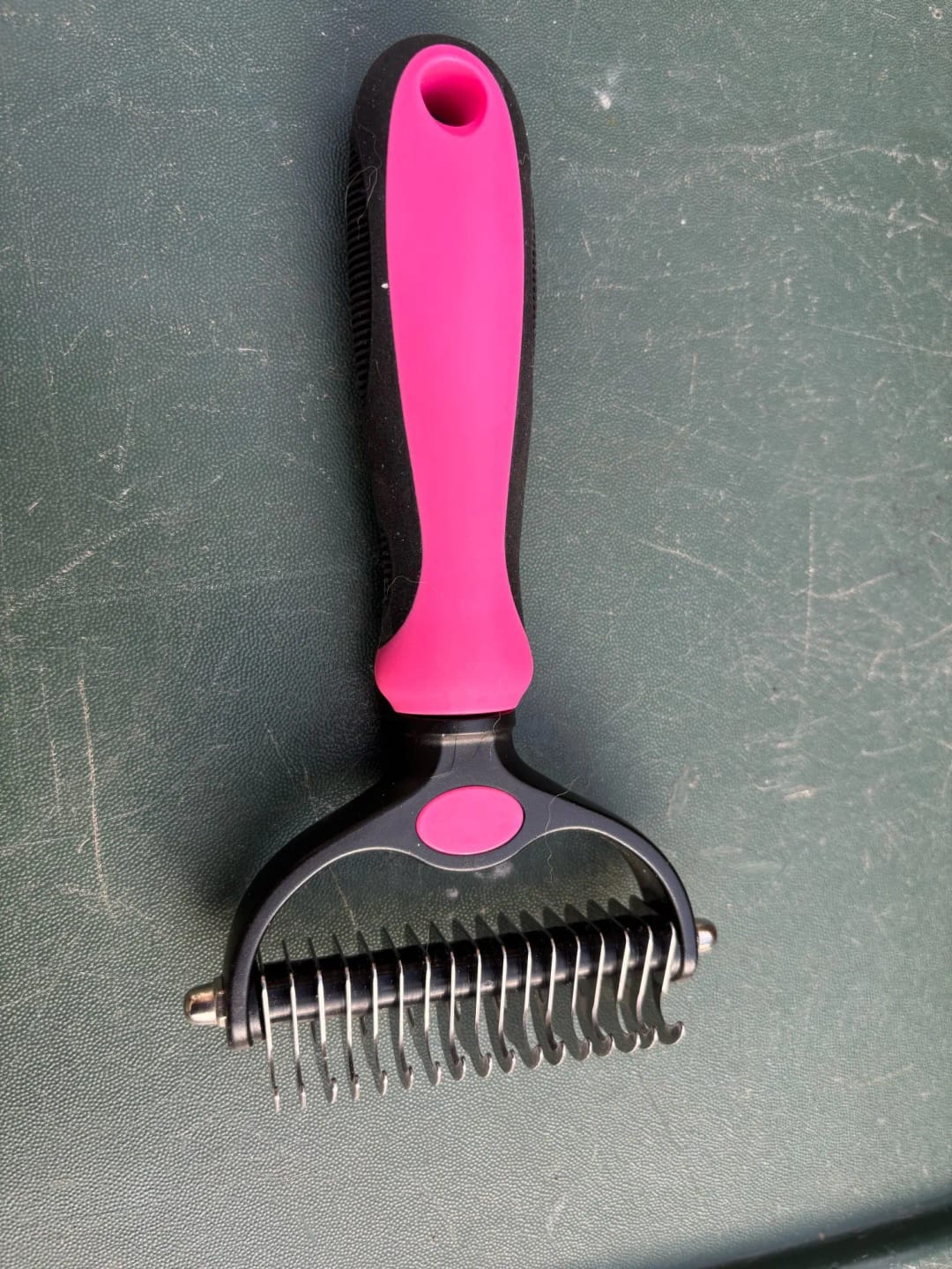 Customer photo review of Double-Sided Dog Dematting Comb & Deshedding Tool for Dogs & Cats