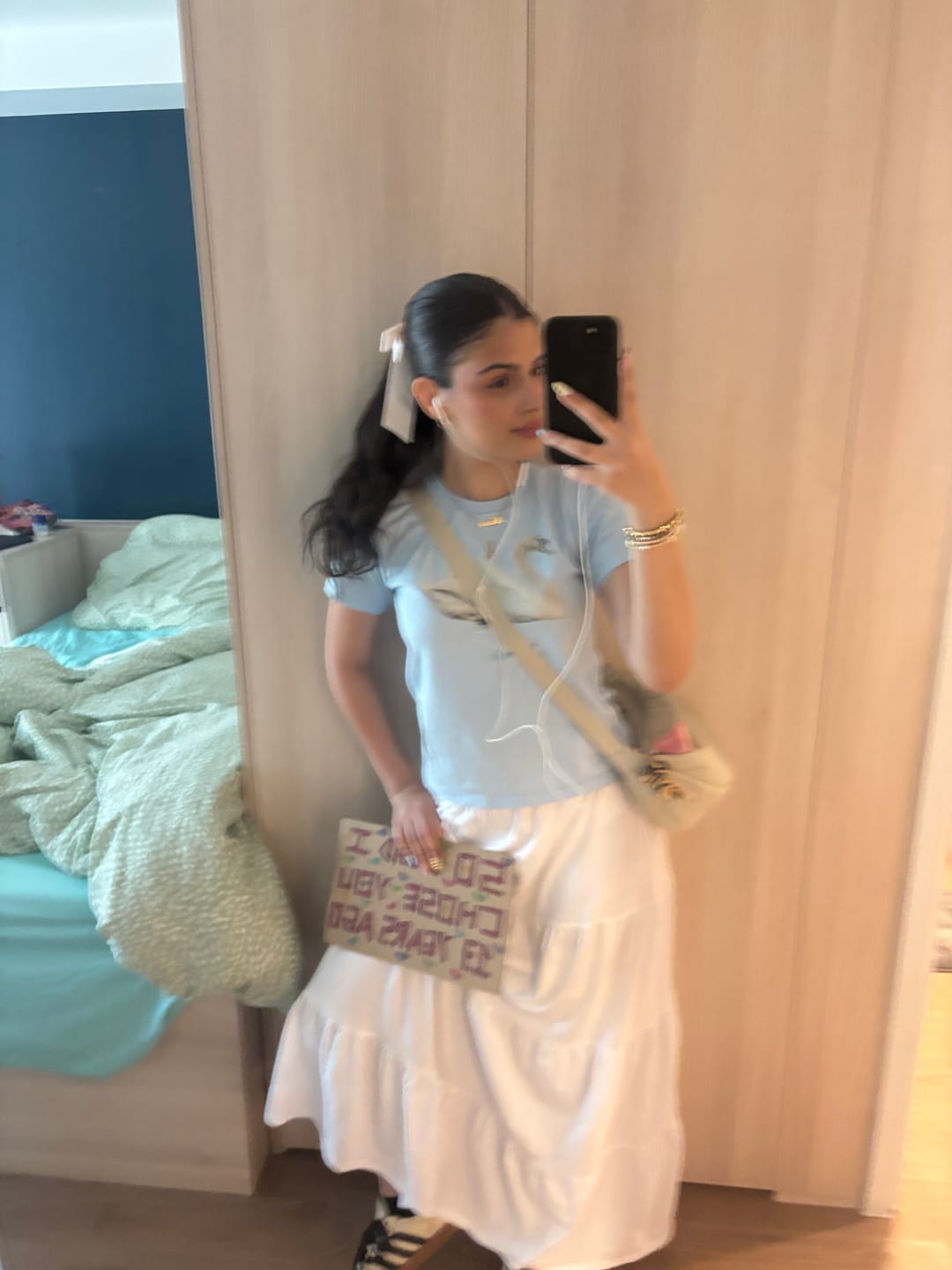Customer photo review of swan song baby tee