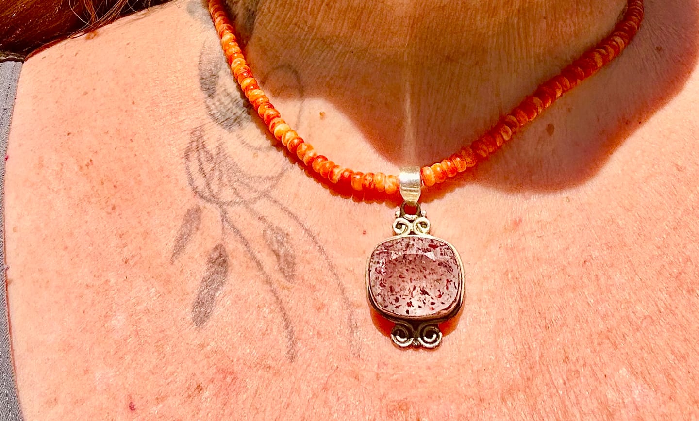 Customer photo review of Premium Faceted Lepidocrocite Pendant 1 1/2" (.925 Sterling Silver)