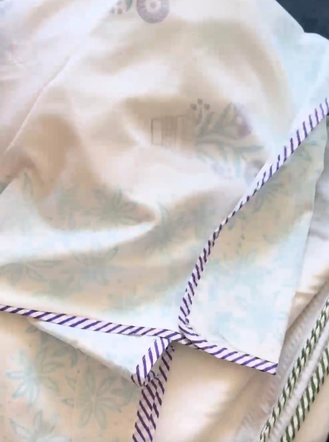 Customer photo review of Blooming Vase Organic Muslin Blanket — Hand Block Printed