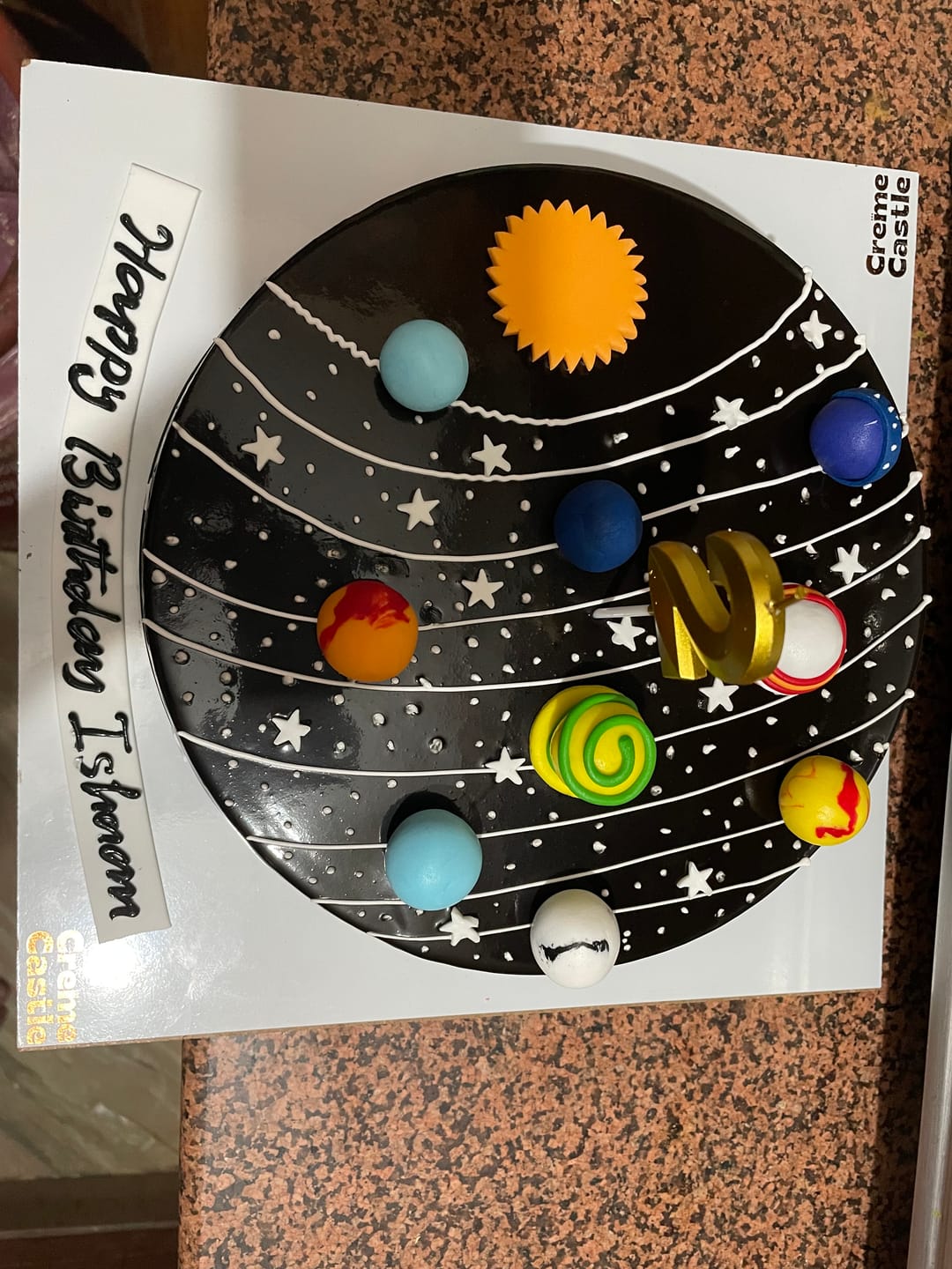 Customer photo review of Solar System Theme Cake