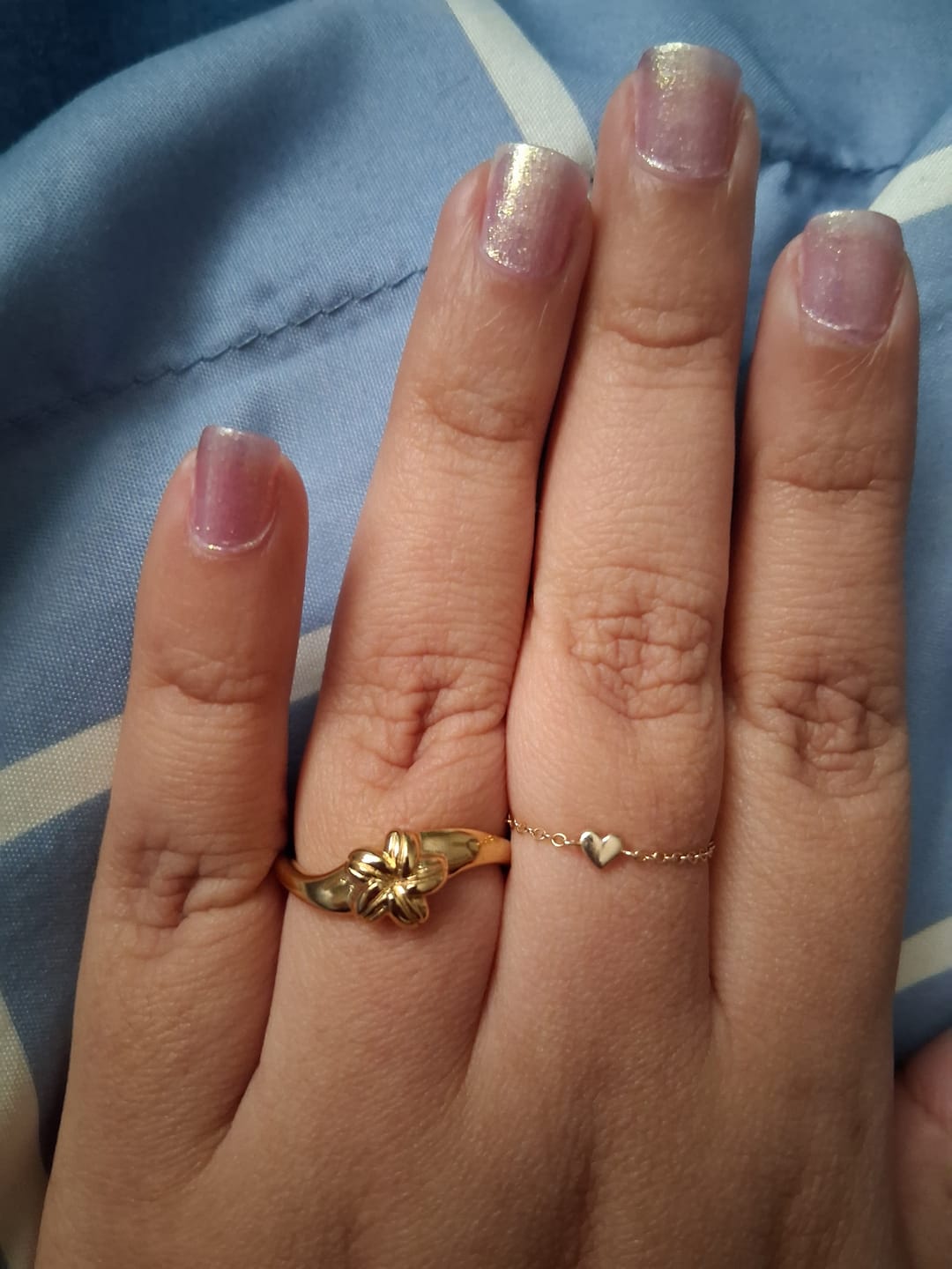 Customer photo review of Cowrie Plumeria Ring
