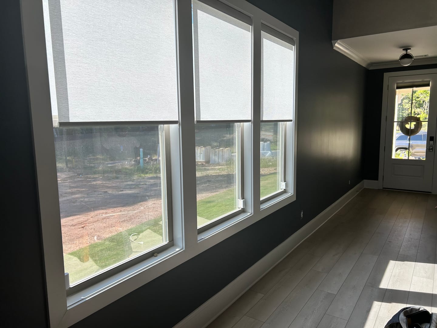 Customer photo review of SmartWings Motorized Light Filtering Roller Shades 70% Blackout Safari