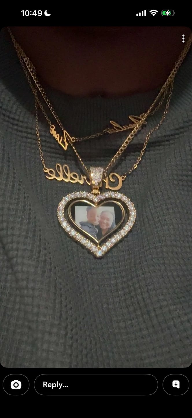 Customer photo review of Iced Heart Spinning Photo Pendant