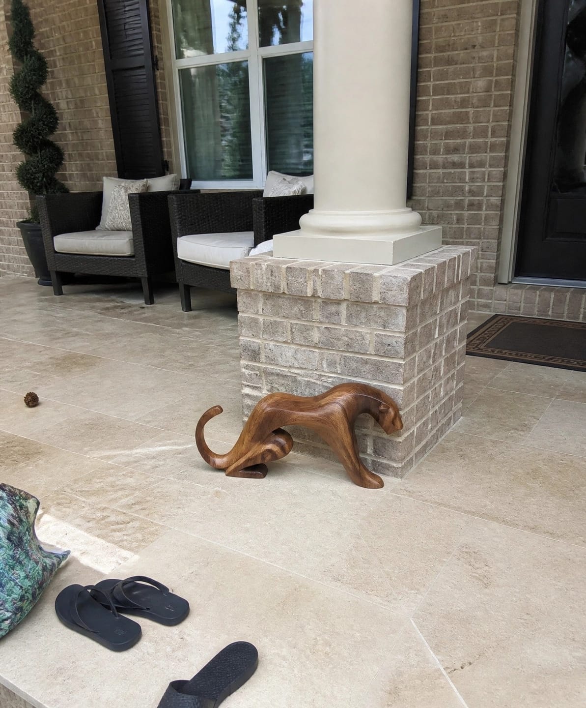 Customer photo review of Sinuous Stalker: The Hand-Carved Abstract Wood Panther Sculpture| Wood Sculpture