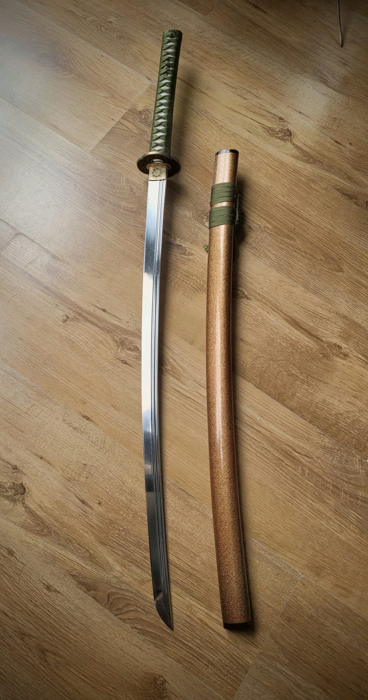 Customer photo review of The Fukyo Katana Spring Steel Double Bohi Razor Sharp