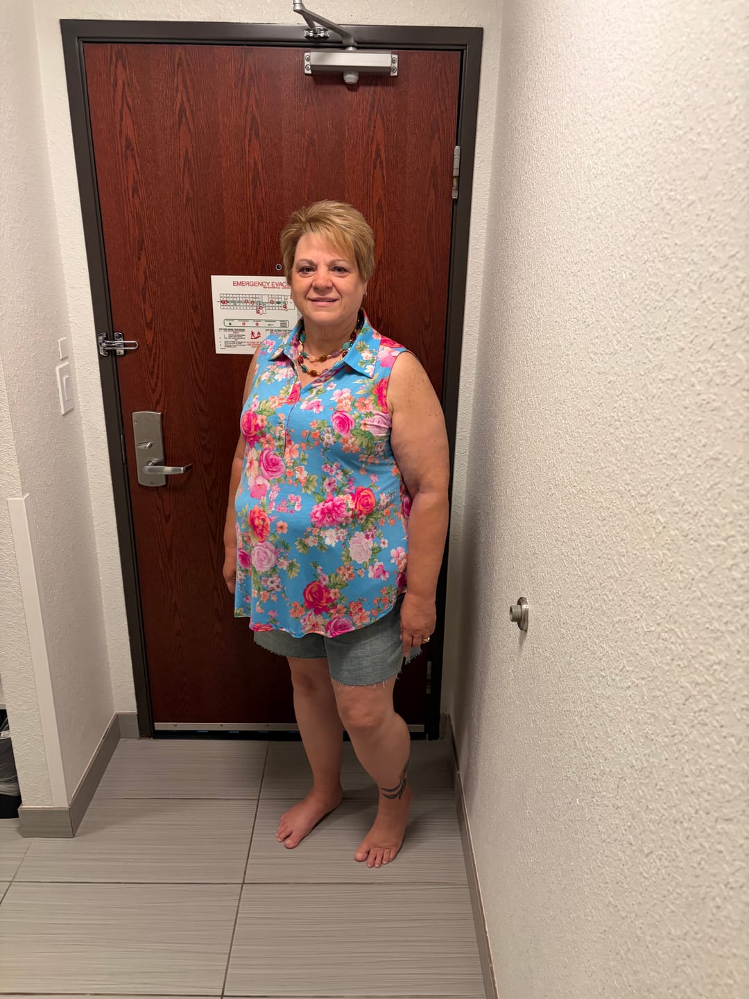 Customer photo review of Sleeveless Floral Blouse W/ Collar & Gold Buttons