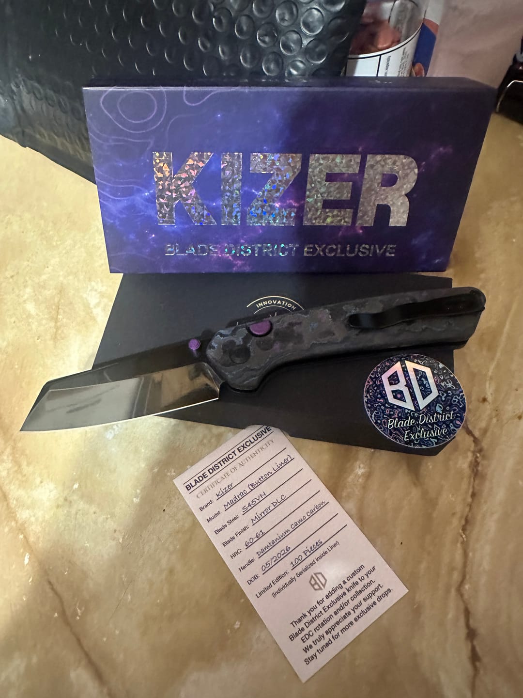 Customer photo review of Kizer Madrac Button Liner Lock Camo Carbon Mirror DLC S45VN BLADE DISTRICT EXCLUSIVE