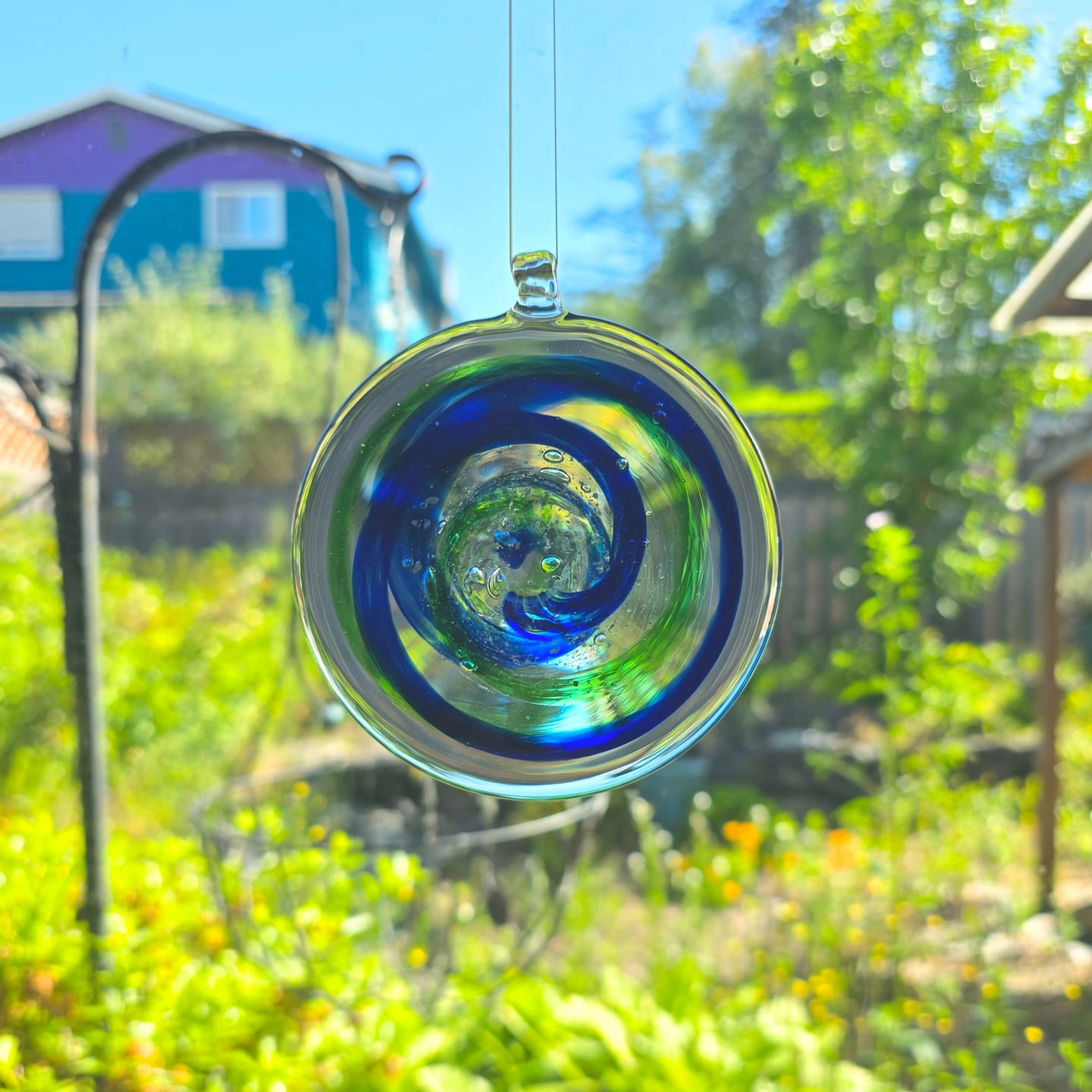 Customer photo review of Glass Suncatcher with Infused Cremation Ash