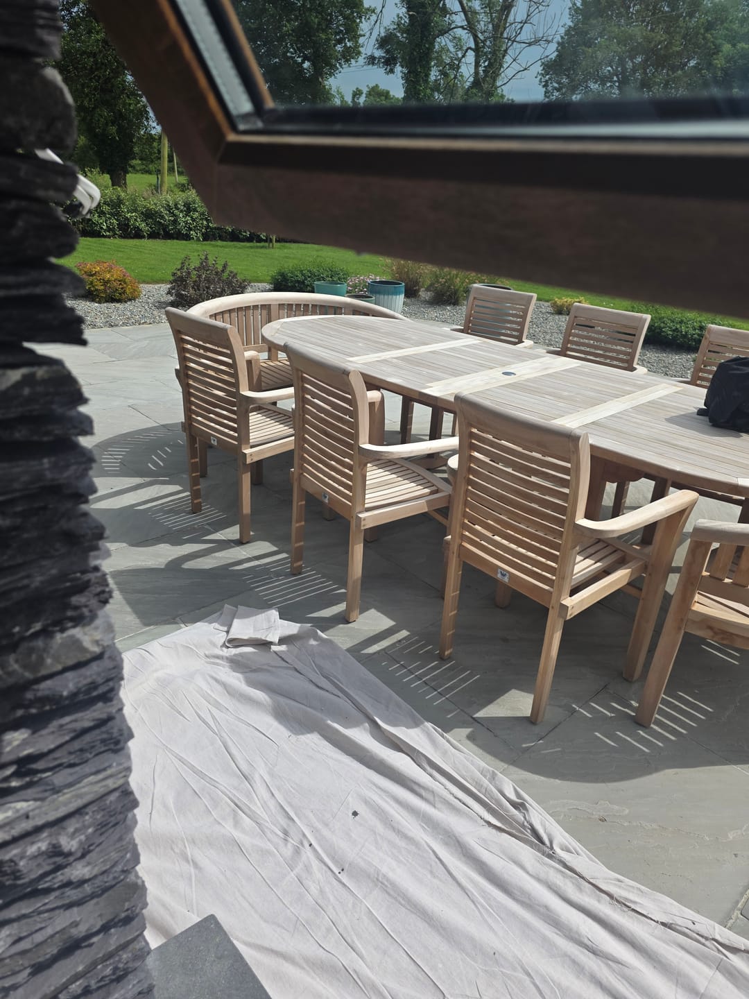 Customer photo review of Teak Oval 2m to 3m Extending Table 4cm Top with 8 Oxford Stacking Chairs & 2 San Francisco Benches, Free Cushions