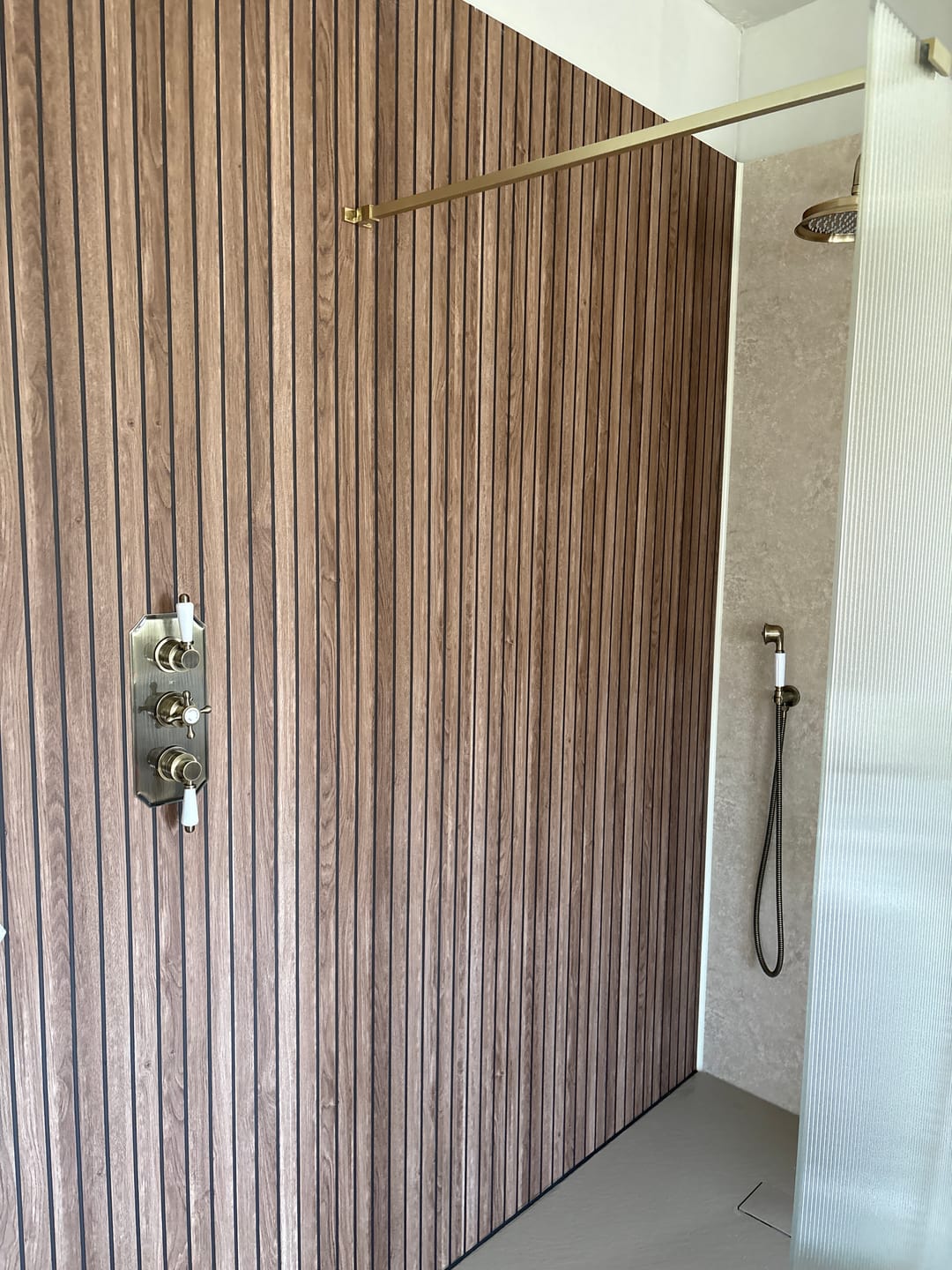 Customer photo review of Sivara Deep Walnut Slatted Wood Effect PVC Waterproof Shower Panel