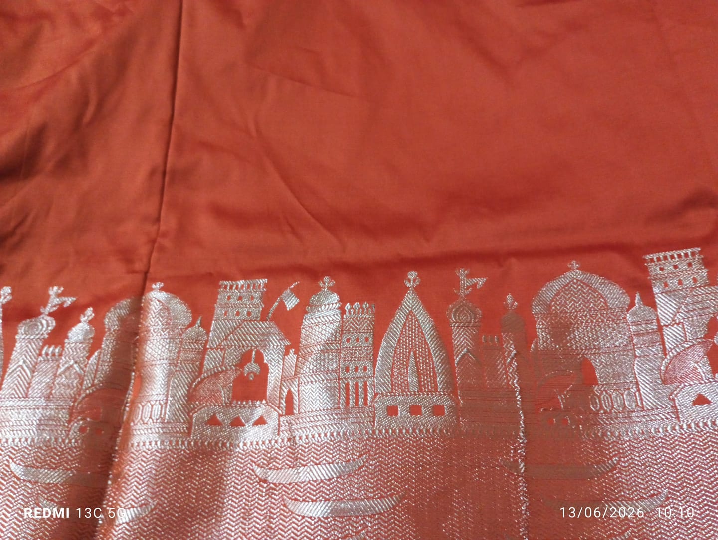Customer photo review of Orange Kalyug Plain Semi Katan Silk Banarasi Saree