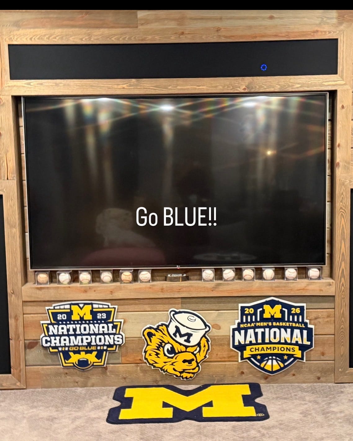 Customer photo review of Michigan Wolverines Official 2023 National Champions 3D Vintage Metal Wall Art