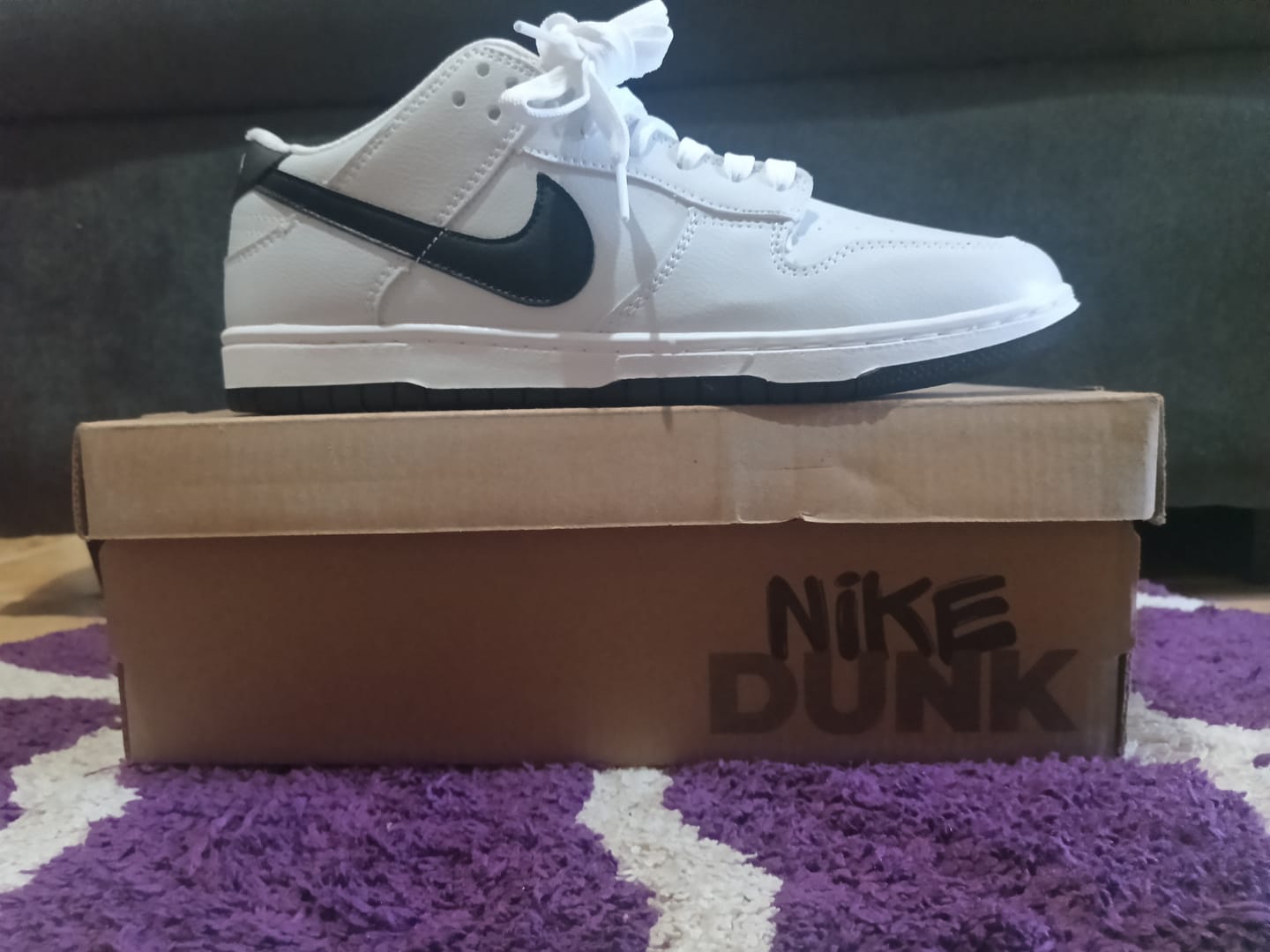 Customer photo review of Tenis Dunk Blanco Negro