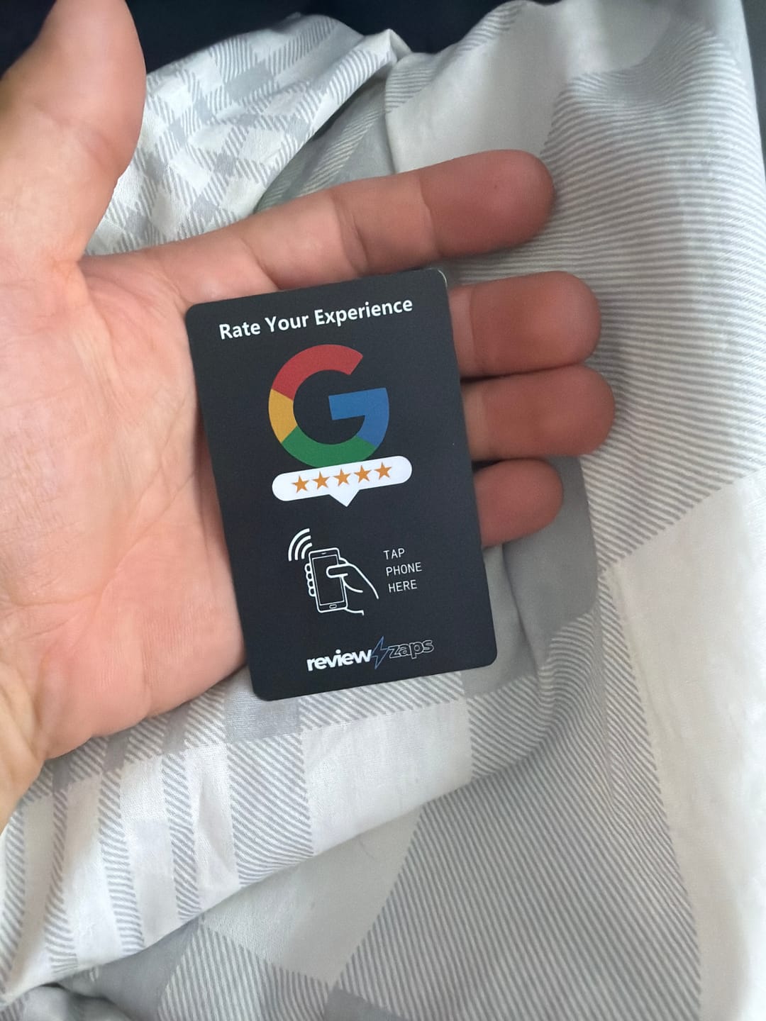 Customer photo review of NFC Google Review Card
