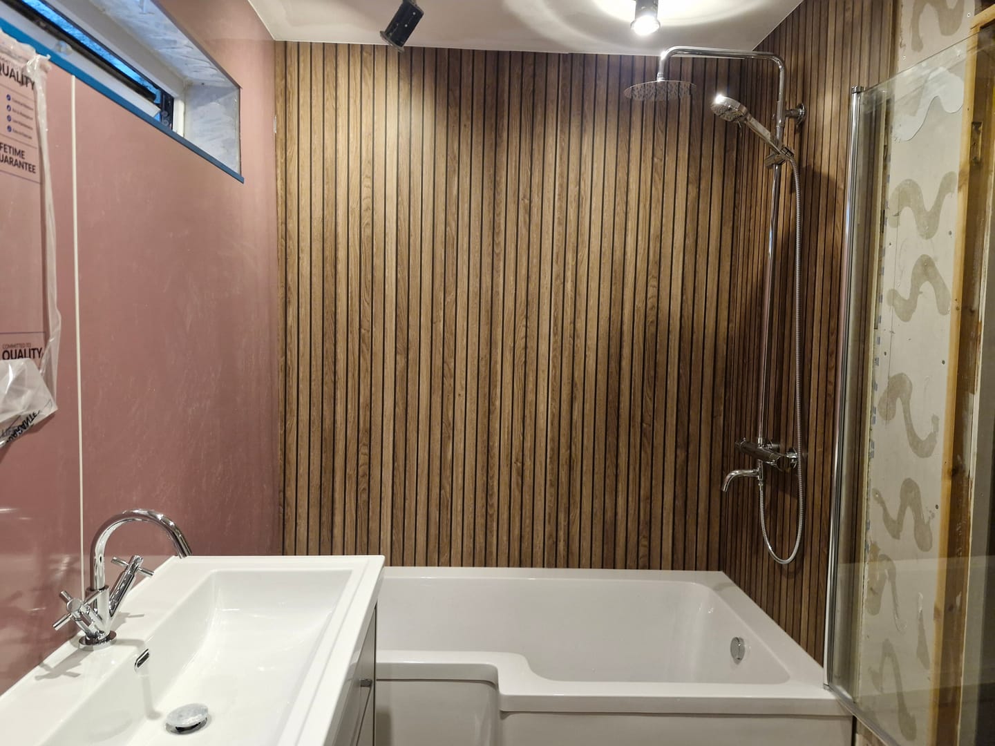 Customer photo review of Sivara Deep Walnut Slatted Wood Effect PVC Waterproof Shower Panel