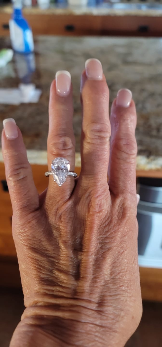 Customer photo review of Louily Honorable 8.0 Carat Pear Cut Simulated Diamond Engagement Ring In Sterling Silver