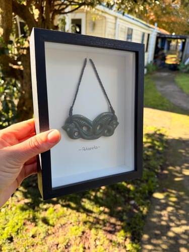 Customer photo review of Genuine NZ Greenstone Pekapeka Manaia Breastplate Necklace