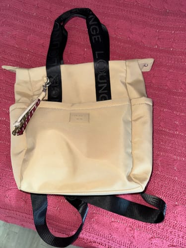 Reseña con foto de un cliente sobre Mochila Llavero Street