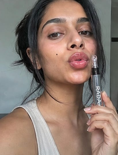 Customer photo review of Kiss Me More Lip Plumper