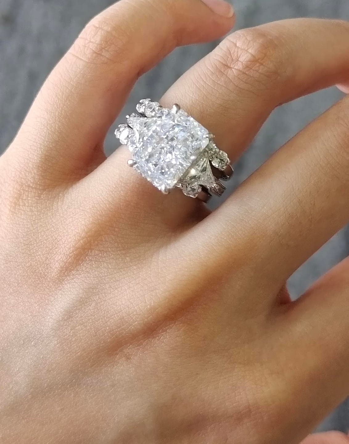 Customer photo review of S925 3PC 5.0Ct Radiant Cut Wedding Ring Set White Gold Side Stone Engagement Rings With 2PC Pavé Wedding Band