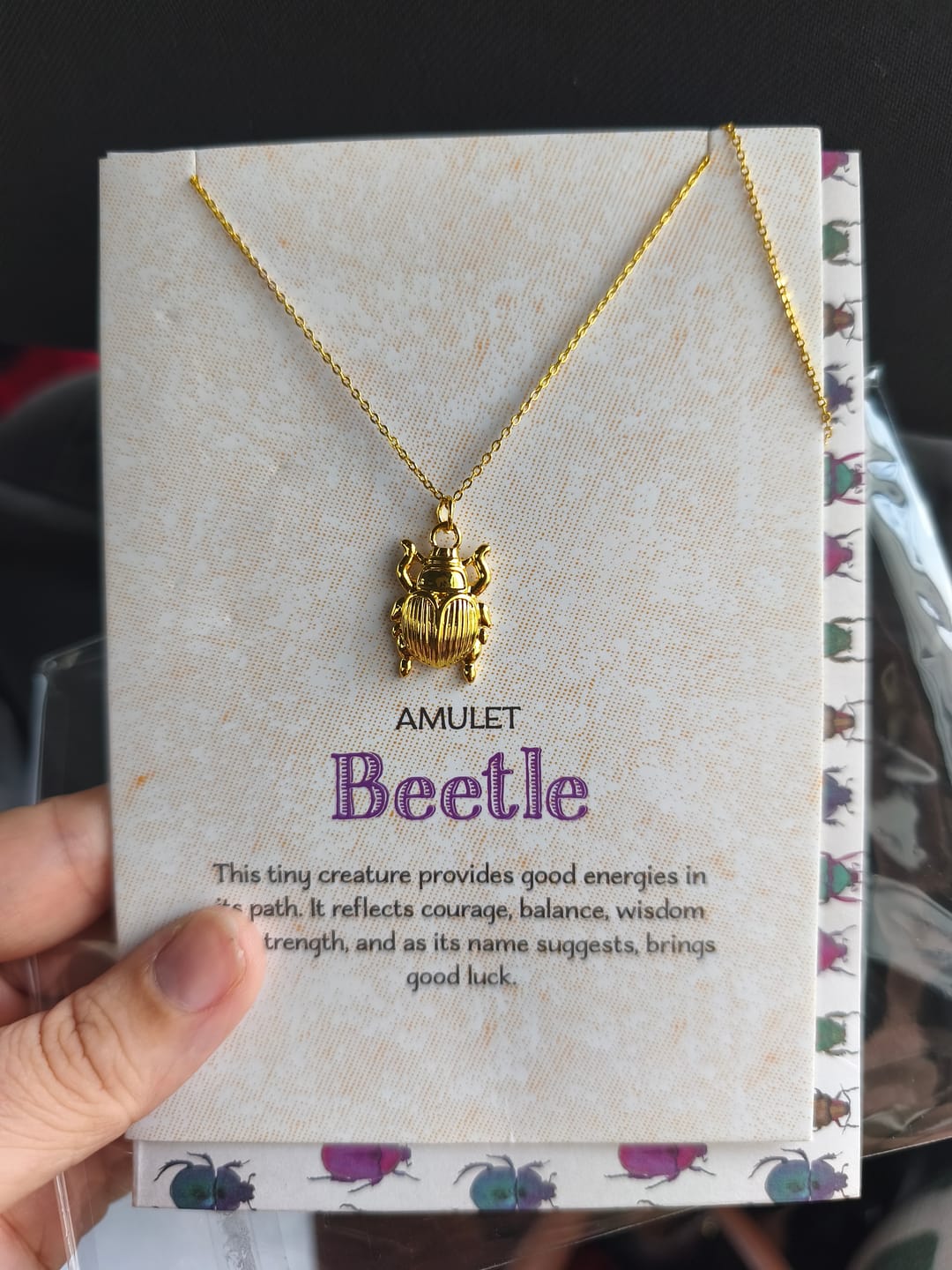 Customer photo review of Glücksbringer Käfer Halskette (gold) inkl. Geschenkkarte