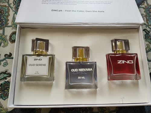Customer's OUD Supreme BUNDLE showing the three included perfume bottles inside the white presentation box.