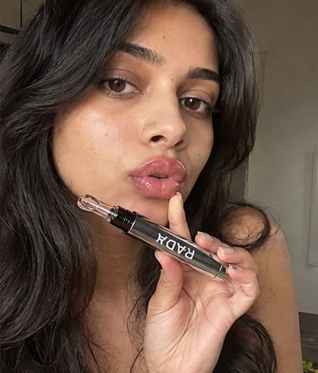 Customer photo review of Kiss Me More Lip Plumper
