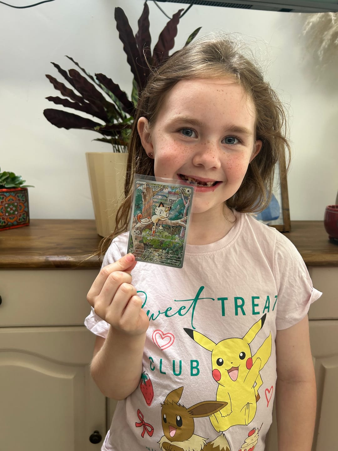 Customer photo review of Pokemon TCG Meowth 106/094 - Phantasmal Flames