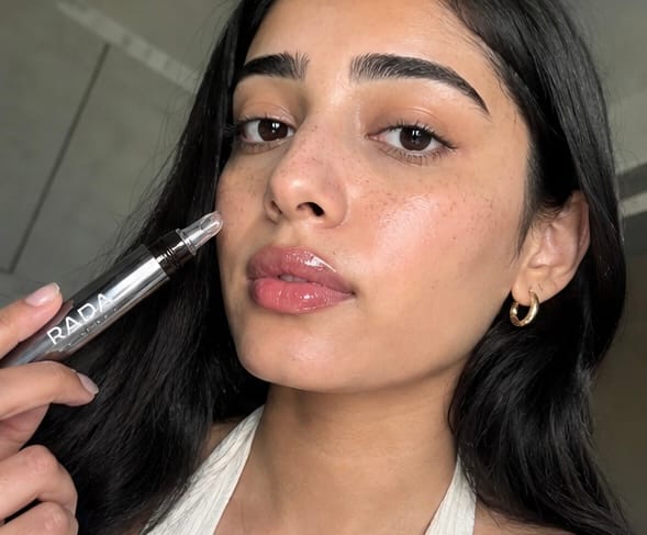 Customer photo review of Kiss Me More Lip Plumper