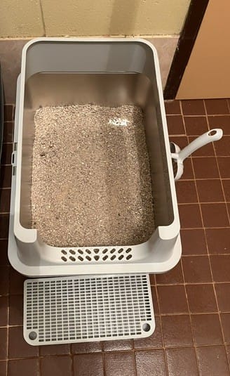 Customer photo review of Stainless Steel Cat Litter Box Large Semi-Enclosed Easy Cleaning Pet Toilet