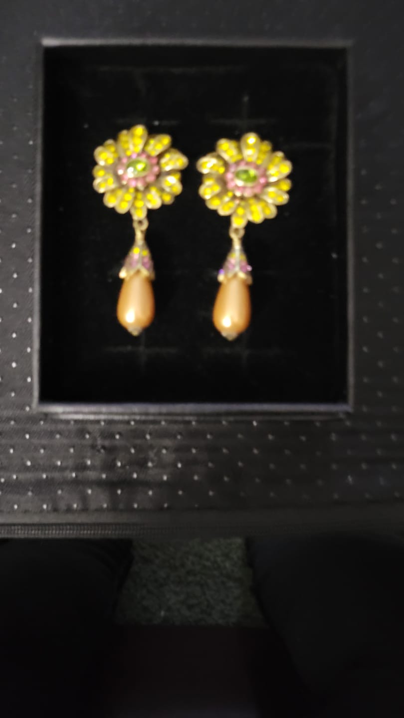 Customer photo review of Heidi Daus®"Gerber Daisy Crazy" Floral Dangle Earrings