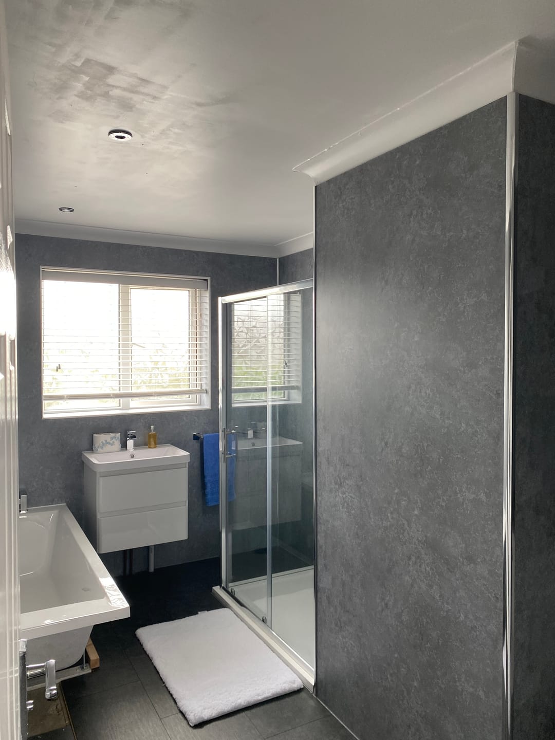 Customer photo review of Premium Grey Concrete Matt Shower Wall Panel - 1M x 2.4M