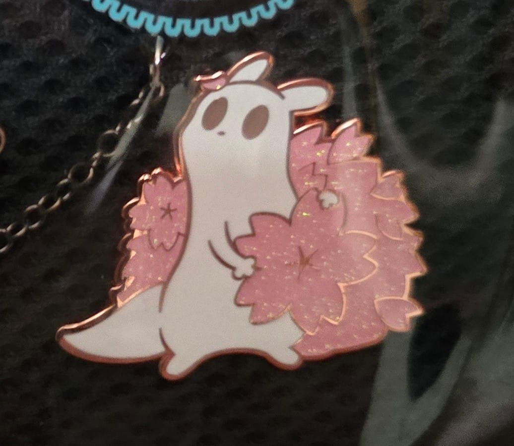 Customer photo review of Rain World - Survivor Cherry Blossom Pin