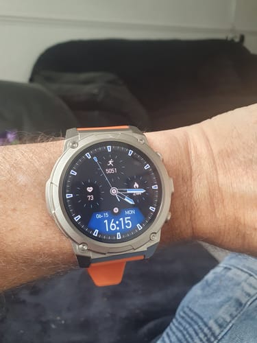Customer's Gard Pro Ultra 3 watch on their wrist, featuring a silver case and an orange strap.