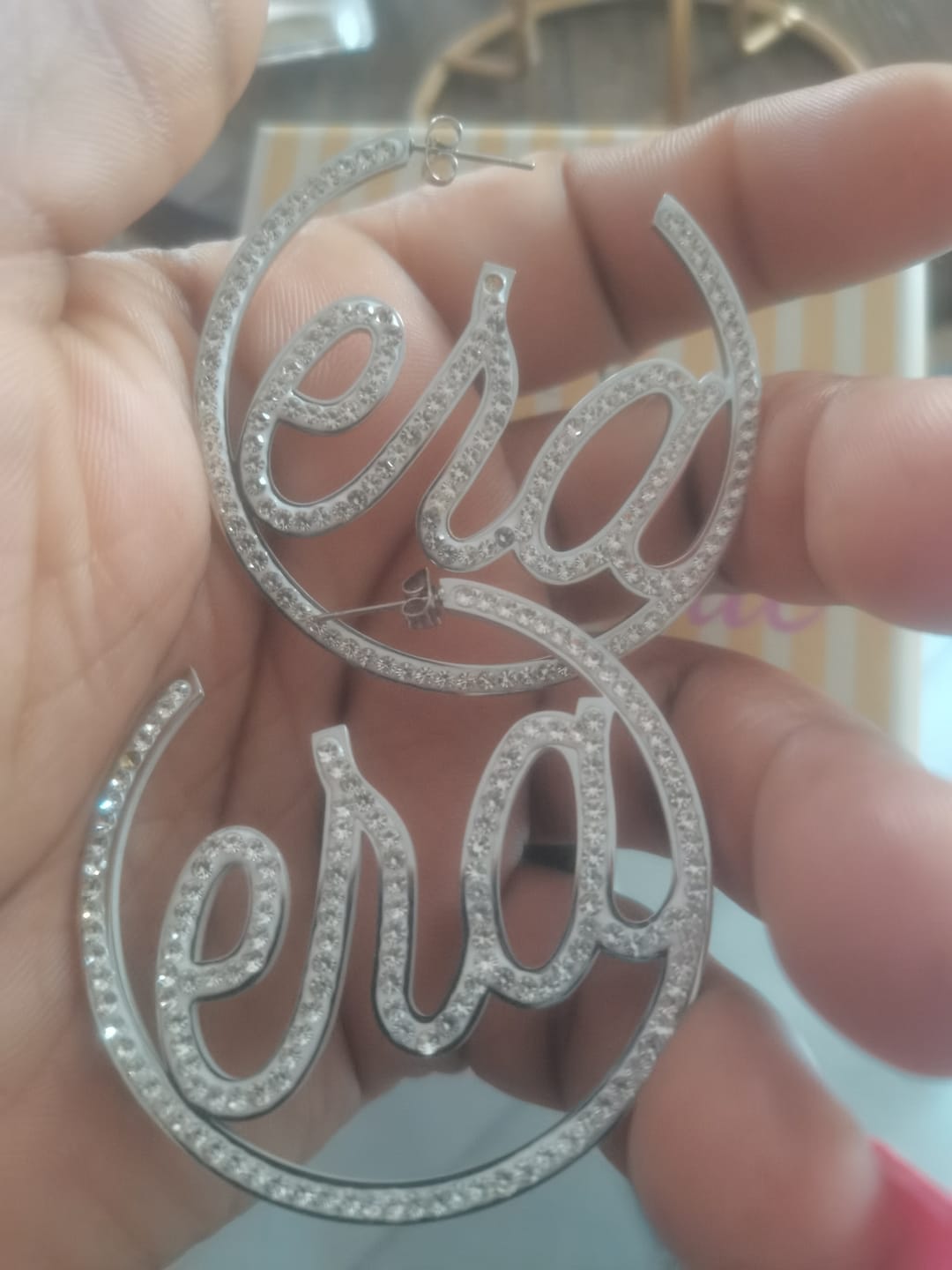 Customer photo review of Silver Luxe Logo Hoops