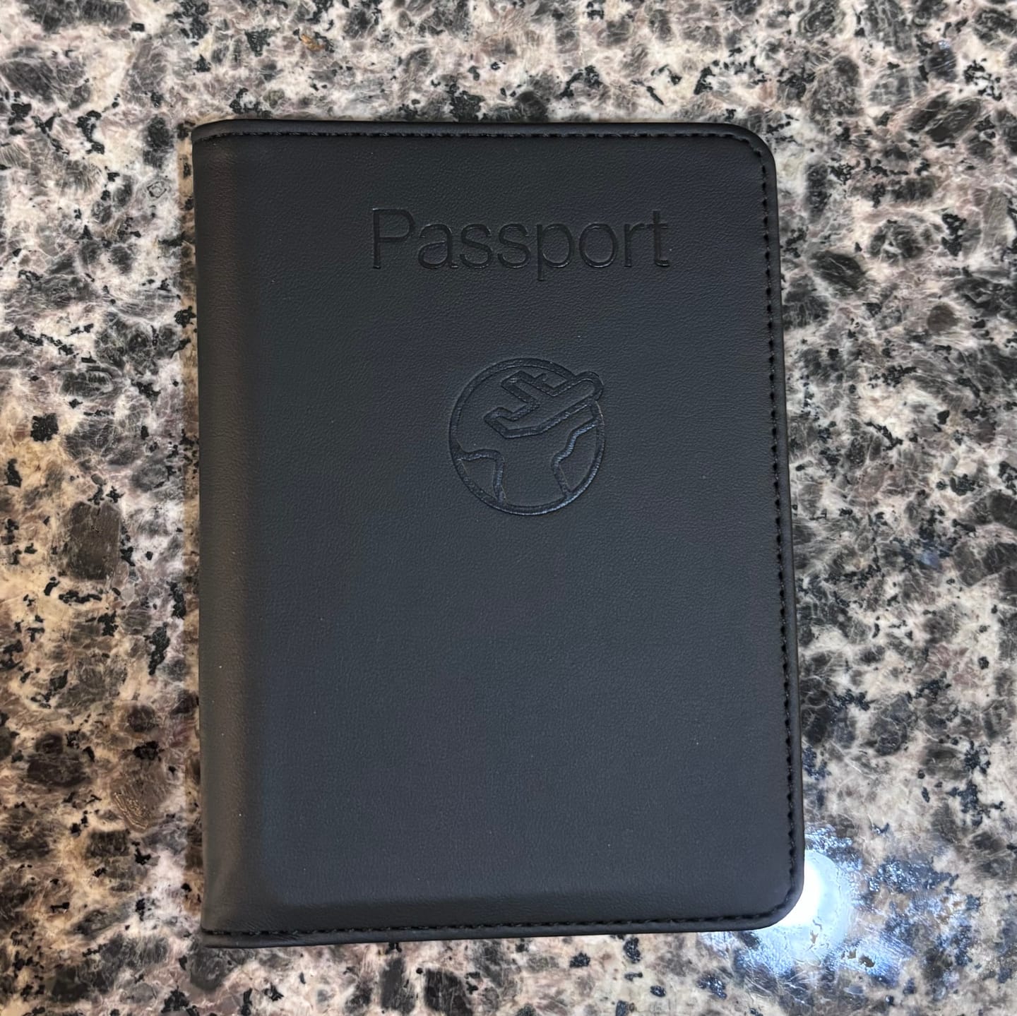 Customer photo review of Trackable Passport Cover