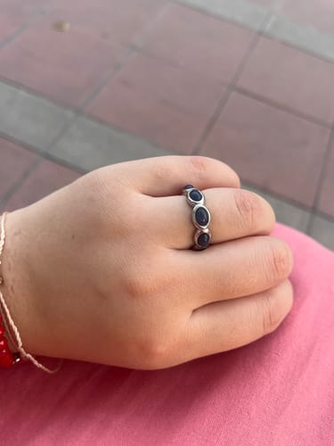 Reseña con foto de un cliente sobre Anillo Borlas