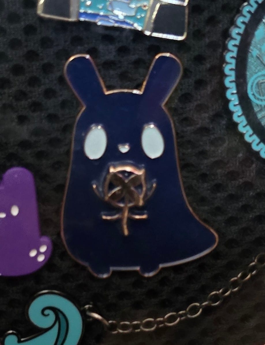 Customer photo review of Rain World- Karmic Bloom Pin