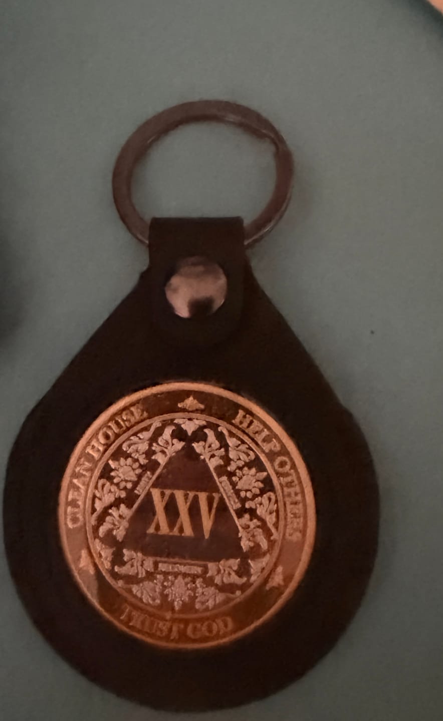 Customer photo review of Sobriety Mint Genuine Leather 40mm AA Medallion Keychain Holder - Recovery Chip/Coin/Token Holder - Black