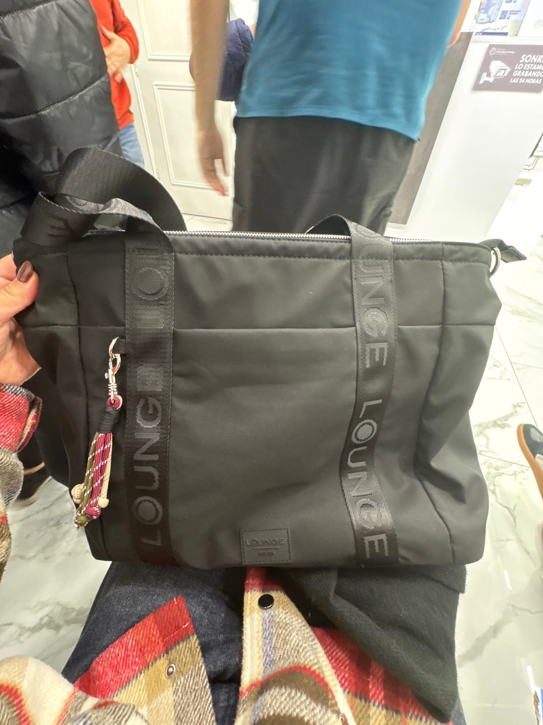 Customer photo review of Bolso Nylon Llavero Street
