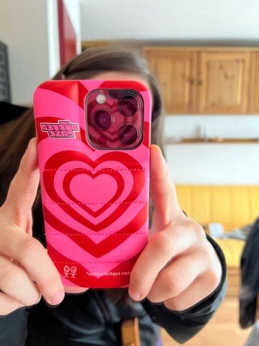 Customer photo review of Love Is Love Puffer Case
