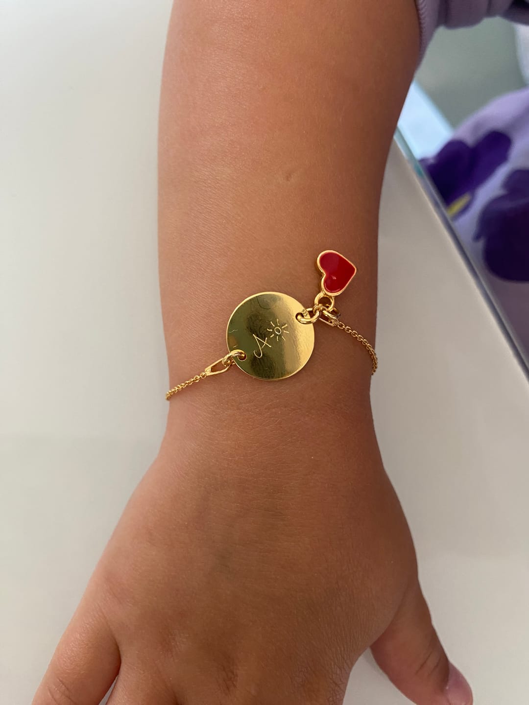 Customer photo review of Baby Armband mit Gravur rund