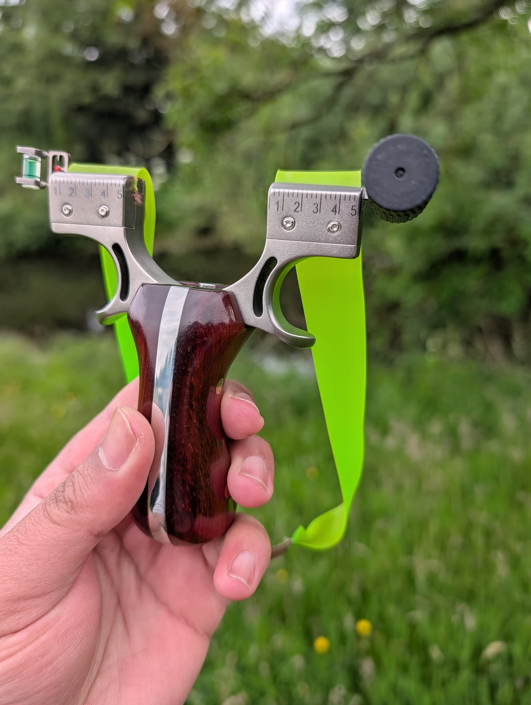 Customer photo review of Laser II - Compact Stainless Steel Wooden Handle Laser Shooting & Hunting Slingshot