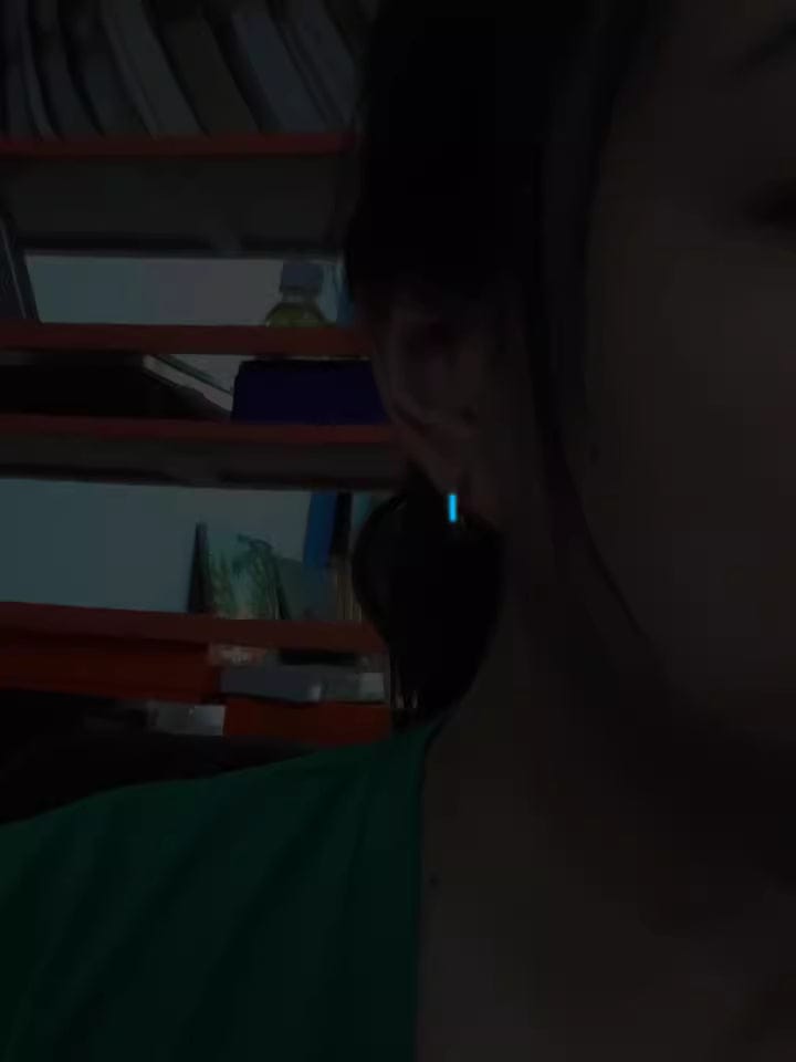 Customer photo review of Luminous Tritium Mobius Earrings