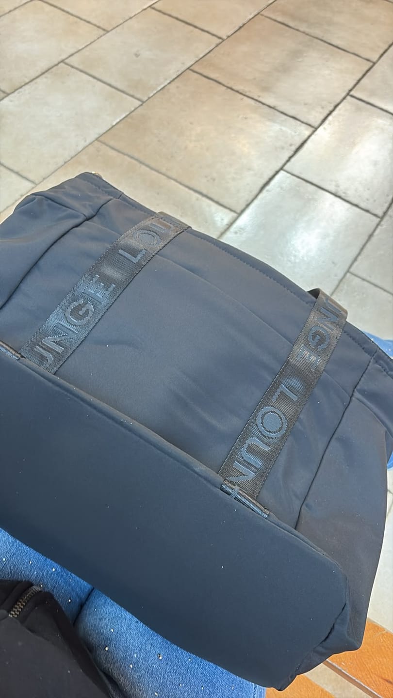 Customer photo review of Bolso Nylon Llavero Street