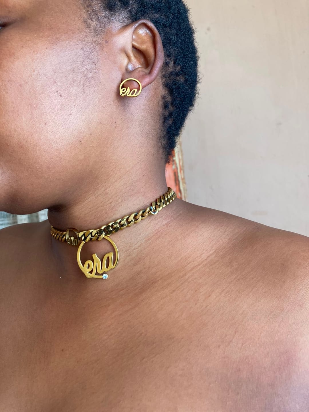 Customer photo review of Gold Era Logo Studs