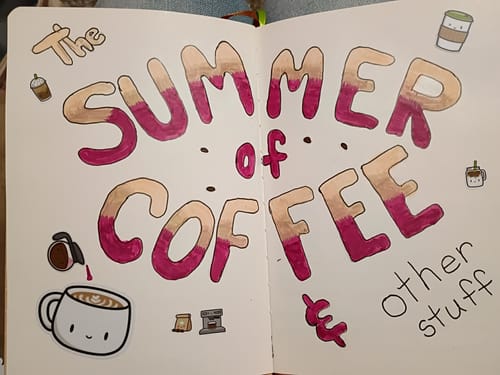 Customer's Coffee Lovers Journal showing a hand-drawn 'Summer of Coffee' page with colorful stickers.