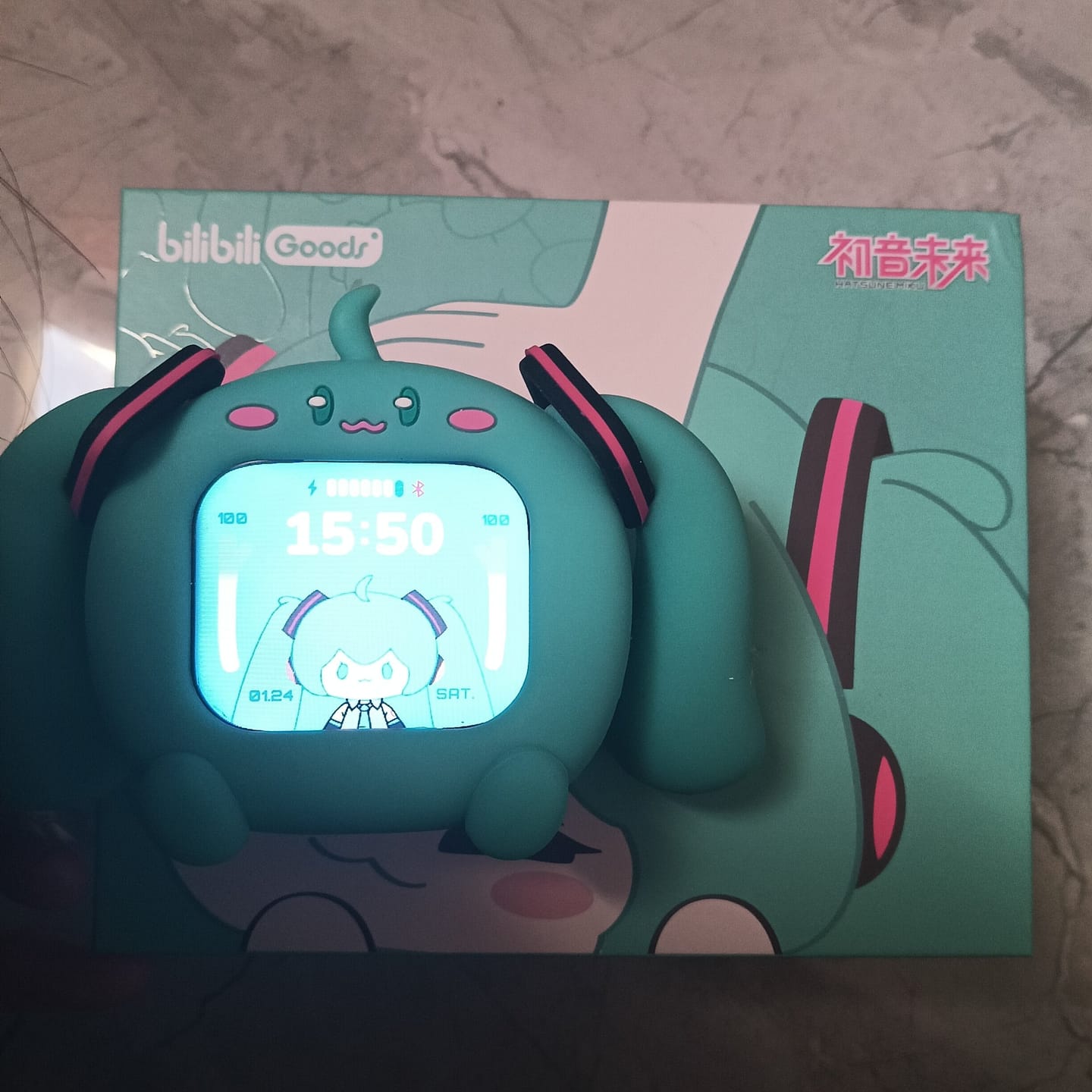 Customer photo review of Officially Licensed Hatsune Miku Wireless Earphones with Smart Display Desktop Stand