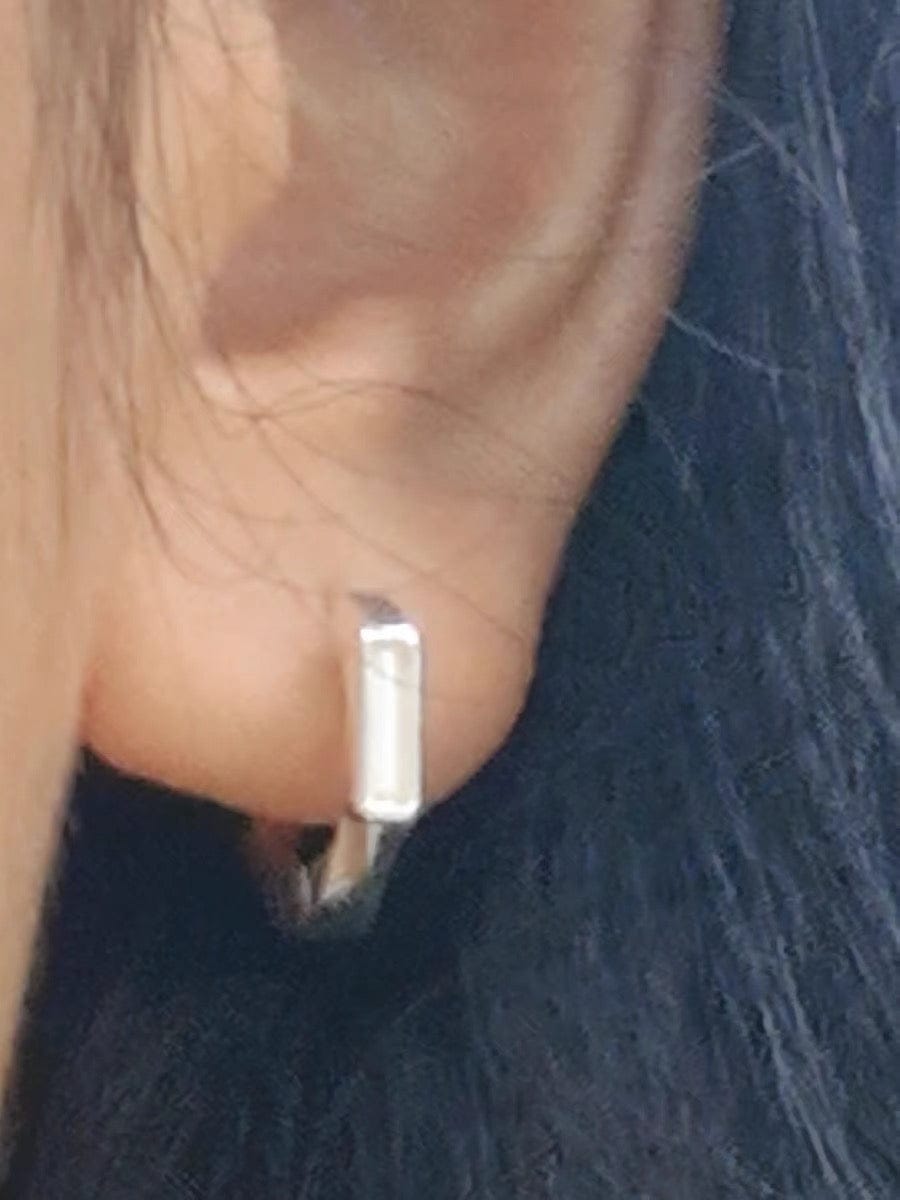 Customer photo review of Luminous Tritium Mobius Earrings